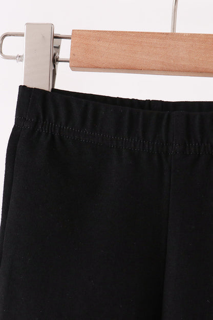 Black scalloped bell pants