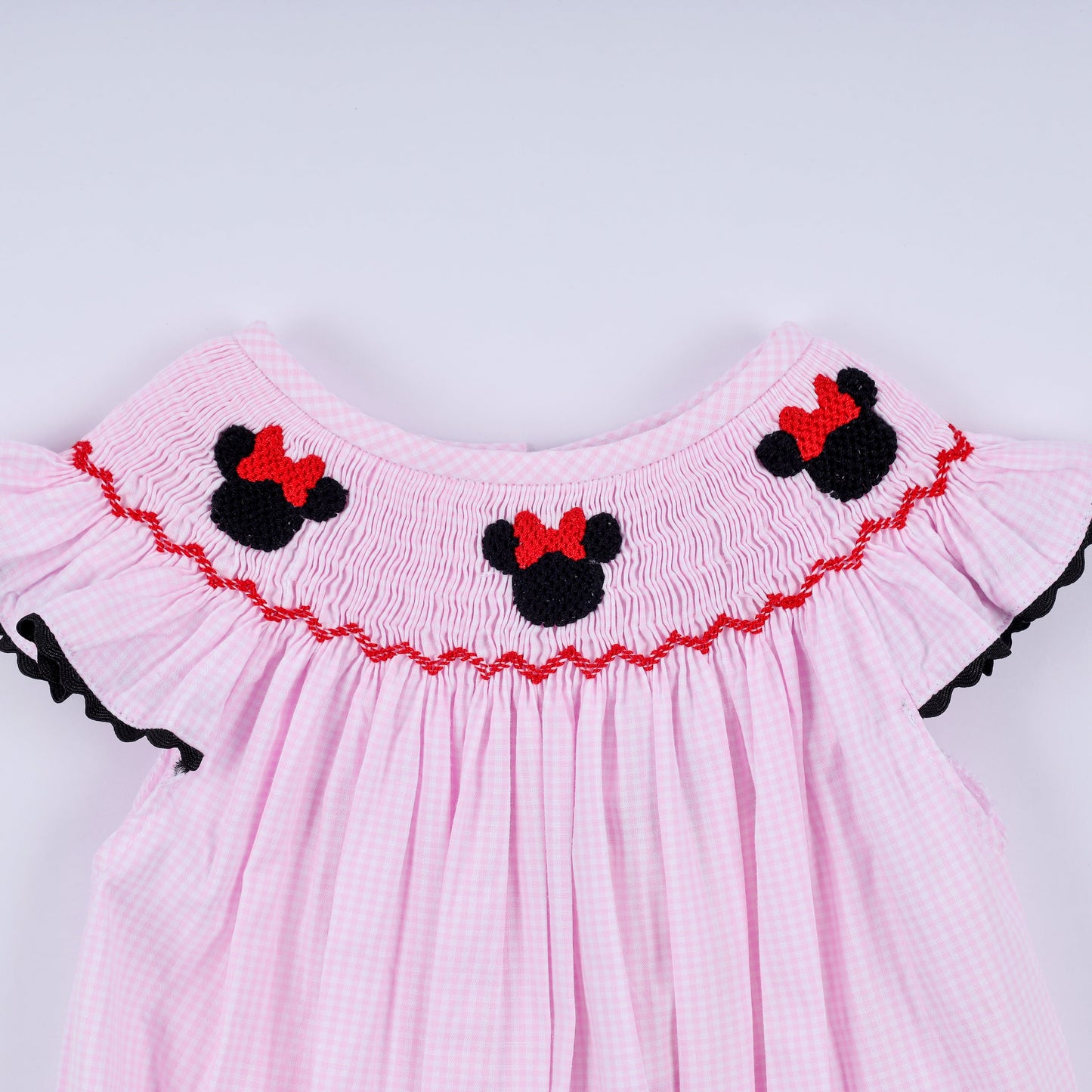 Red character hand smocked plaid ruffle bubble