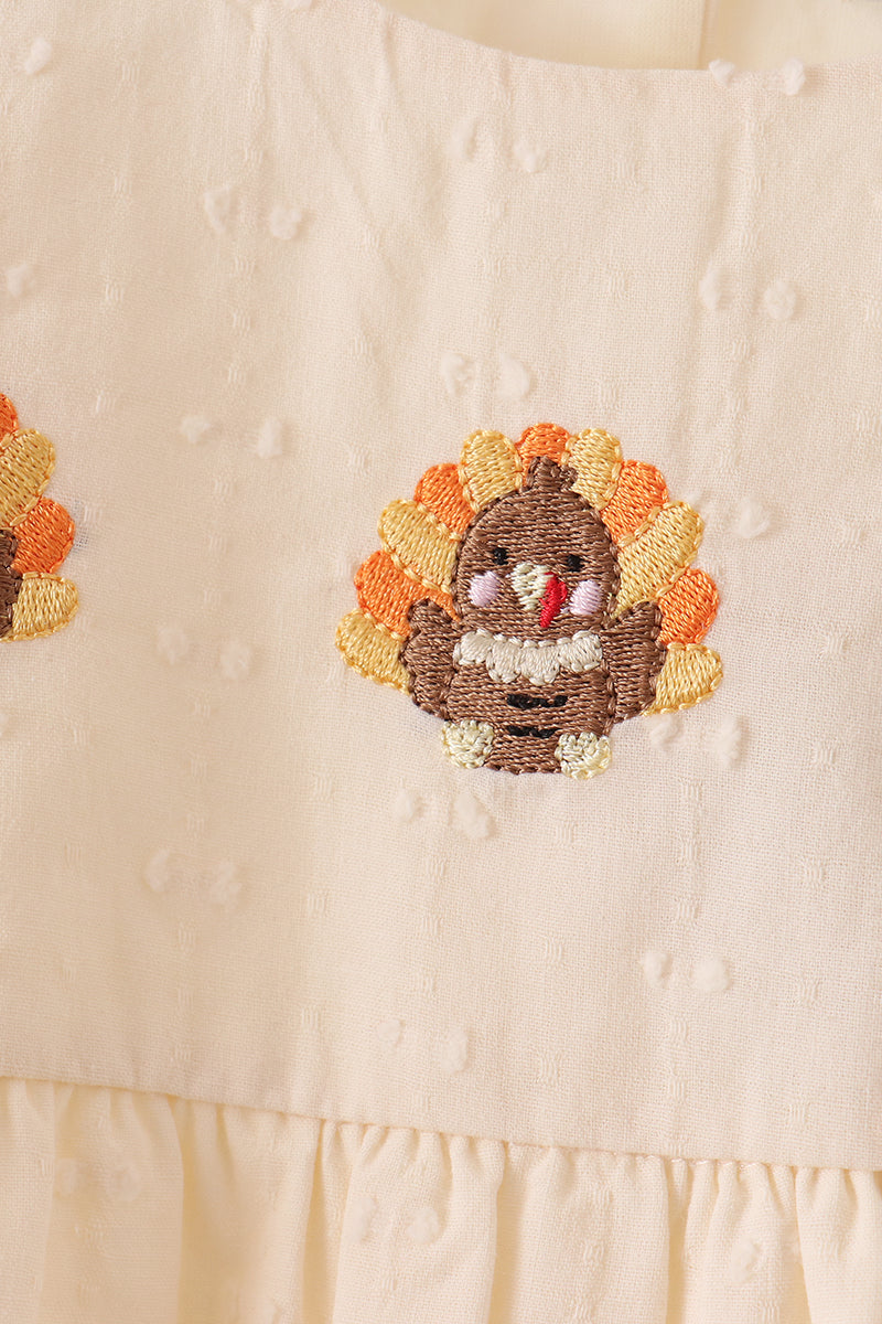 Beige turkey embroidery romper